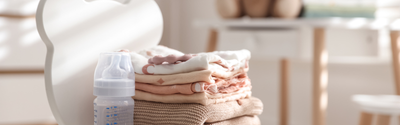 Swaddles, Sleep Sacks, or Pajamas? What Your Baby Really Needs